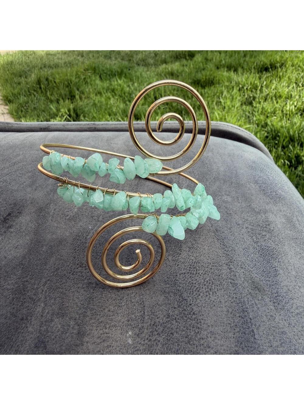 Aquamarine spiral cuff bracelet with gold wire and light blue chips